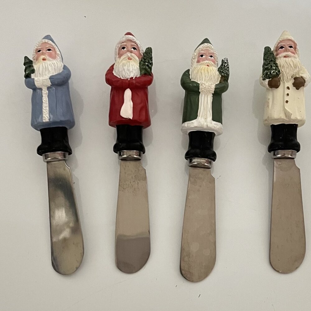 Set of 4 BOSTON WAREHOUSE SANTA SPREADER KNIVES - Preowned